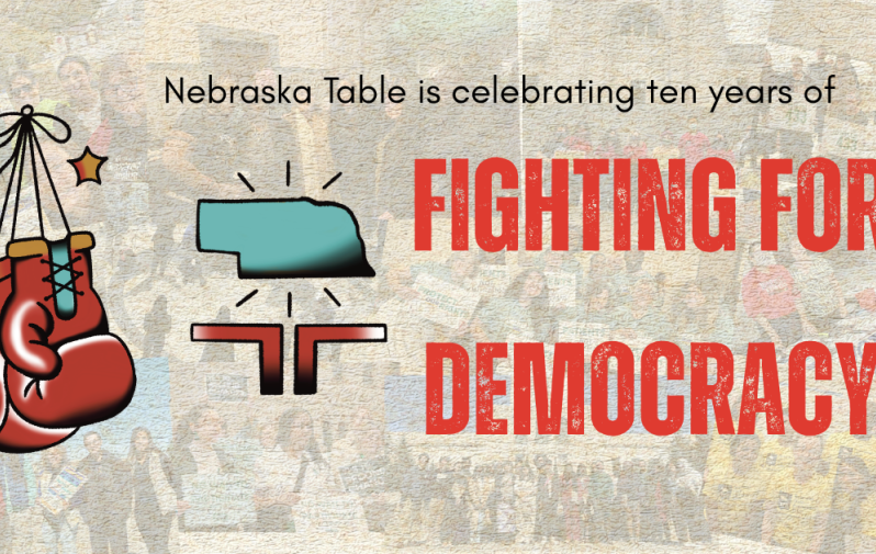 Text reads "Nebraska Table is celebrating ten years of fighting for democracy." accompanied by a graphic of boxing gloves and the Nebraska Table logo