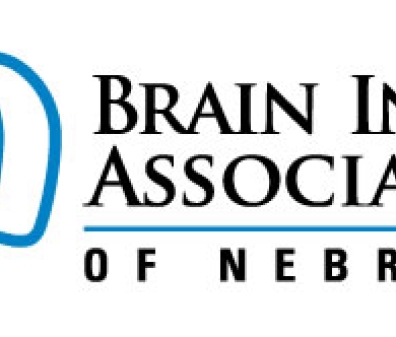 Text reads Brain Injury Association of Nebraska next to a graphic of 3 overlapping heads